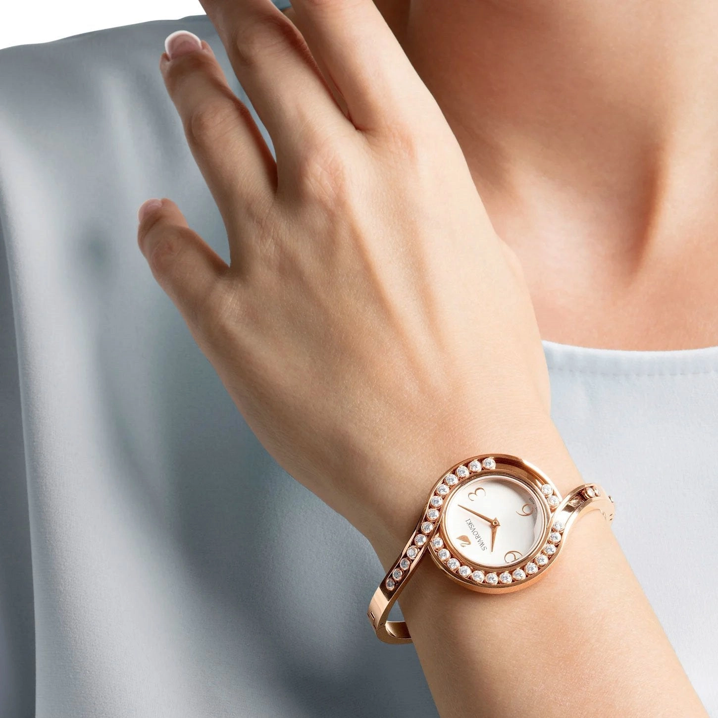 SWAROVSKI Crystal Authentic Lovely Crystals Bangle Watch, Metal Strap, Rose Gold Tone - High Class Stone Studded Swiss Made Timepiece Jewelry and Everyday Accessory for Women